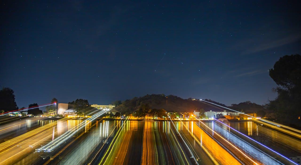 Time Lapse Photography of Cars on Road during Night Time
